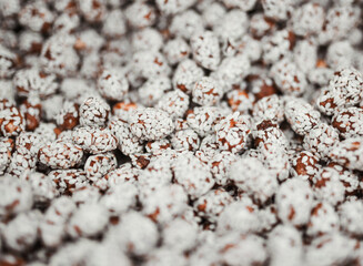 lots of dried fruits and nuts, delicious healthy food, nuts in sesame seeds