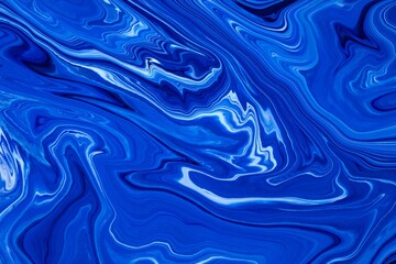 Fluid art texture. Abstract background with iridescent paint effect. Liquid acrylic picture with flows and splashes. Classic blue color of the year 2020. Blue, indigo and white overflowing colors.