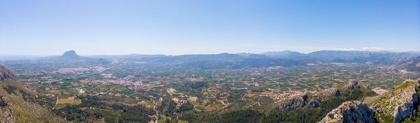 Fototapeta na wymiar Panoramic view of Marina Alta region, in Alicante, Spain. Montgó mountain and Denia city are in the left background.