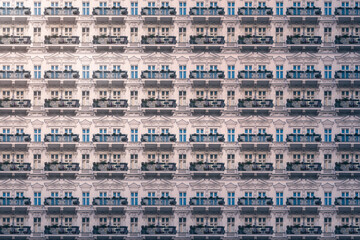 architectural pattern of an old luxury Berlin apartment building ornate balconies and stucco