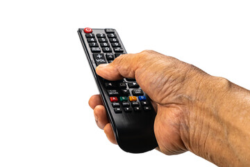 View of old man hand press the button on television remote control to select the television program...