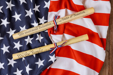 Fourth of July Day. Declaration of Independence parchment roll document with US flag.