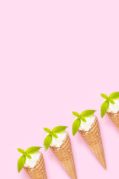 Lots Of Vanilla Ice Cream In A Waffle Cone On A Pink Background