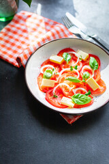tomato salad veggie vegetable basil diet on the table summer healthy food diet meal snack copy space food background rustic. top view vegan or vegetarian food