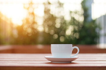 Close up coffee espresso on wood table nature background in garden,