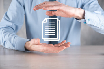 Hand holding a document icon in his hand Document Management Data System Business Internet Technology Concept. Corporate data management system DMS