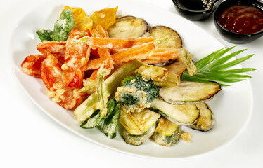 Fast Food - Vegetable Tempura with Soy and Dipping Sauce on white Background - Isolated