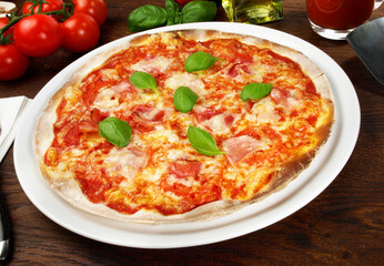 Plate with Pizza, Ham and Mushrooms - Fast Food on wooden Background