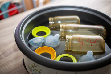 Baby pacifier sterilization in boiling water