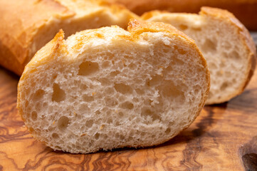 Ingredient for French breakfast, fresh baked crispy baguette white bread