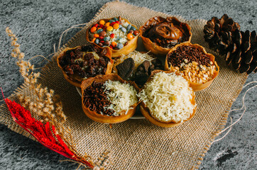 Martabak Manis is Indonesia dessert. Sweet Martabak with chocolate, cheese, peanut. this picture in white background and blurry, selective object.