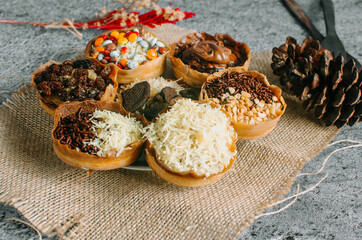 Martabak Manis is Indonesia dessert. Sweet Martabak with chocolate, cheese, peanut. this picture in...