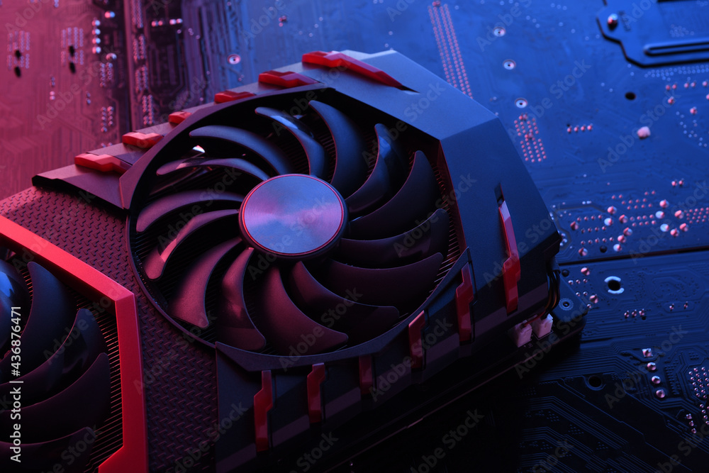 Poster computer game graphics card, videocard with two coolers on circuit board ,motherboard background. cl