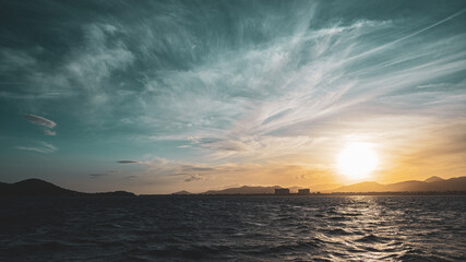 landscape - sunset on the coast, waves, horizon. top view.