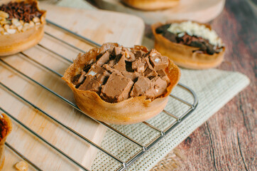 Martabak Manis is Indonesia dessert. Sweet Martabak with chocolate, cheese, peanut. this picture in white background and blurry, selective object.