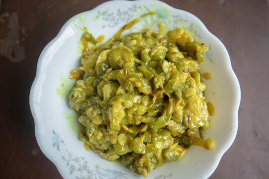 A bowl of Cooked spicy curry of Chinese okra at home in South Asian style in Dhaka, Bangladesh