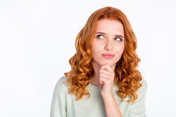 Photo portrait of red haired young girl touching chin dreamy thoughtful looking copyspace isolated...