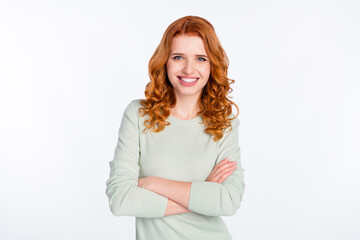 Photo portrait of young woman with crossed hands smiling confident isolated white color background with empty space