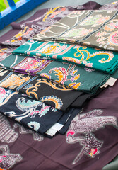 Batik is the art of painting cloth using wax and natural or artificial coloring. Close up colorful and beautiful batik fabric. Javanese batik. Indonesian batik.