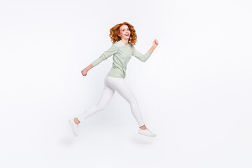 Fototapeta na wymiar Full length body size side profile photo young woman red hair jumping high running on sale isolated white color background