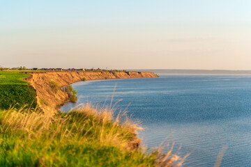 Grassy slopes in front of the Volga River in summer