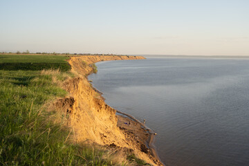 Grassy slopes in front of the Volga River in summer