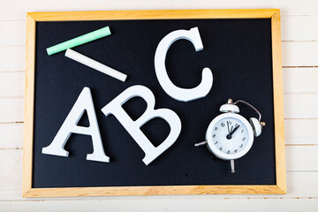 Letters ABC and chalk board.