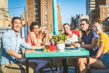 Group of friends having party on a rooftop