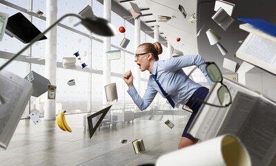 Portrait of business woman running