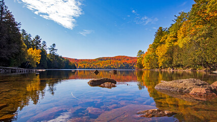 Fototapeta premium Fall colours at Meech Lake in Gatineau Park, Quebec, Canada