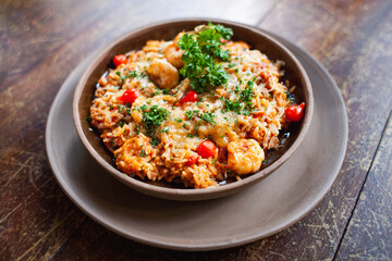 rice with shrimp and pepper on plate