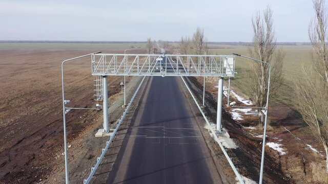 Weigh-In-Motion System for Weighing of Motion Truck. These systems provide the ability to weigh a truck in motion in real-time. Aerial view