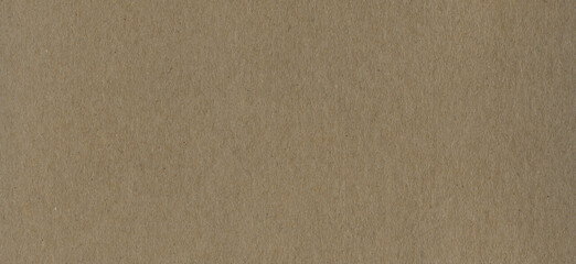 Clean brown cardboard paper background texture. Horizontal banner