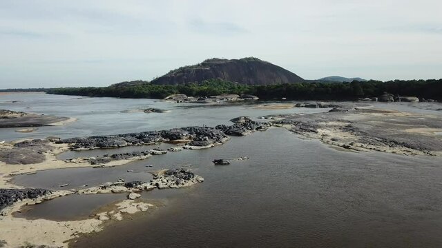 Beautiful wide aerial shot of Orinoco River with mountain in Vichada Colombia