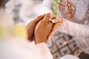 bride and groom shaking hands