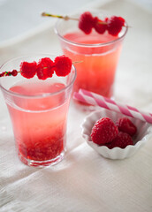 Raspberry Beverage with Raspberry Garnish with Straws
