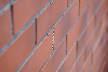 ventilation plastic insert in a brick wall