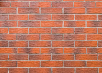 The wall is decorated with artificial stone as a background.