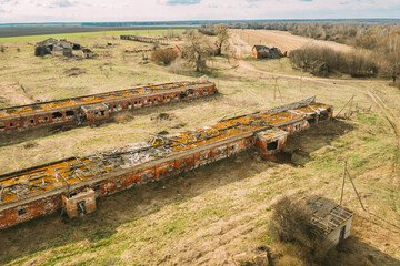 Belarus. Abandoned Barn, Shed, Cowsheds, Farm House In Chernobyl Resettlement Zone. Chornobyl Catastrophe Disasters. Dilapidated House In Belarusian Village. Whole Villages Must Be Disposed