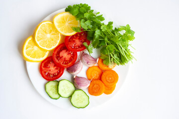 Summer menu, a plate of vegetables on a white background, flat lay
