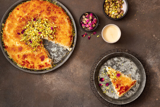 Sweets arabic dessert kunafa, kadayif with pistachio and cheese