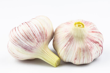 Young garlic close-up isolated on a white background.