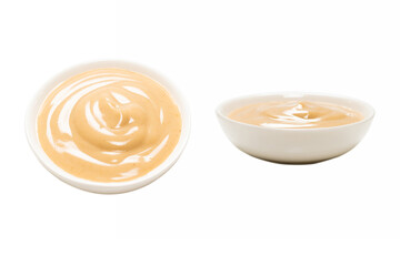 Mushroom sauce in a bowl isolated on white background.