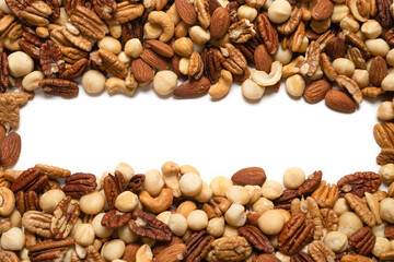 Mix of nuts isolated on white background. Top view.