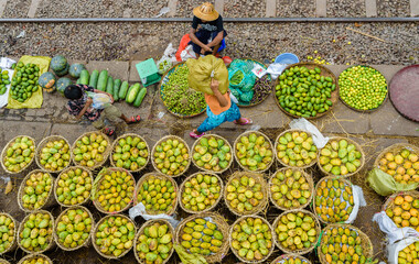 Yangon 18th June, 2017 in Danyingon Market, big market in yangon. they sell street vegetable, fruit, food and stay near to the train station. Good place for tourism, travel by Yangon Circular Train.