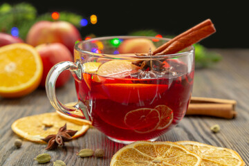 Mulled wine with spices and orange fruit