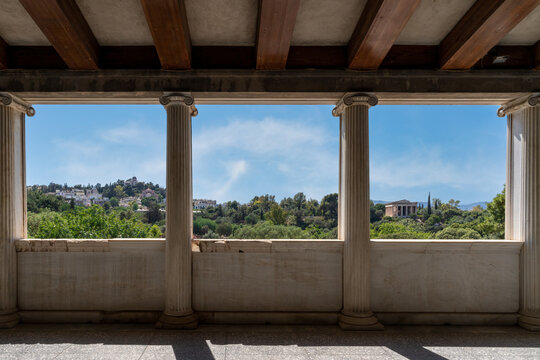 Athens, Attica, Greece. Stoa of Attalus, scenic view from the upper floor to the Temple of Hephaestus (right), old National Observatory of Athens (left). Ancient Agora of Athens