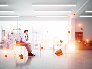 Young businessman sitting on an office chair