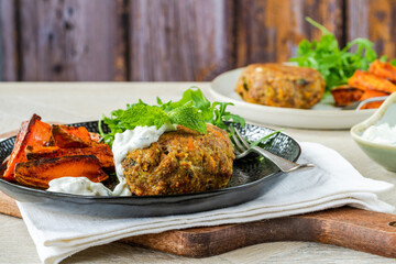 Lamb burger with spicy sweet potato wedges