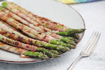 Seasonal fresh asparagus fried with bacon